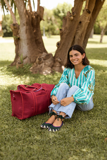MAGENTA SUITCASE AND TOILETRY BAG