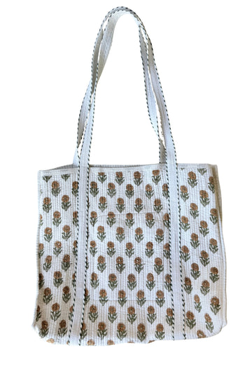 VALISE ET TROUSSE DE TOILETTE IKAT EN VIOLET ET OCRE