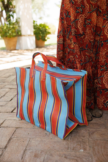 VALISE ET TROUSSE DE TOILETTE IKAT EN VIOLET ET OCRE