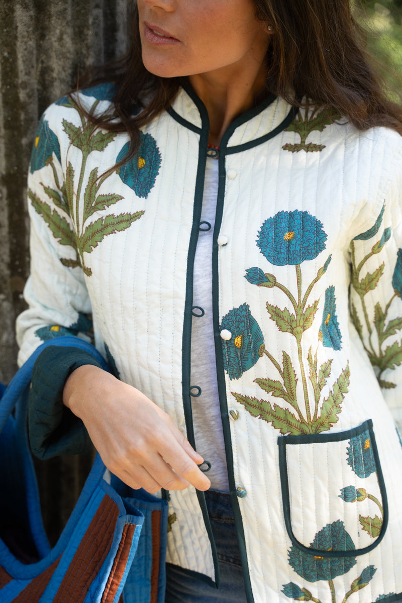 CHAQUETA BLANCA FLORES PETRÓLEO