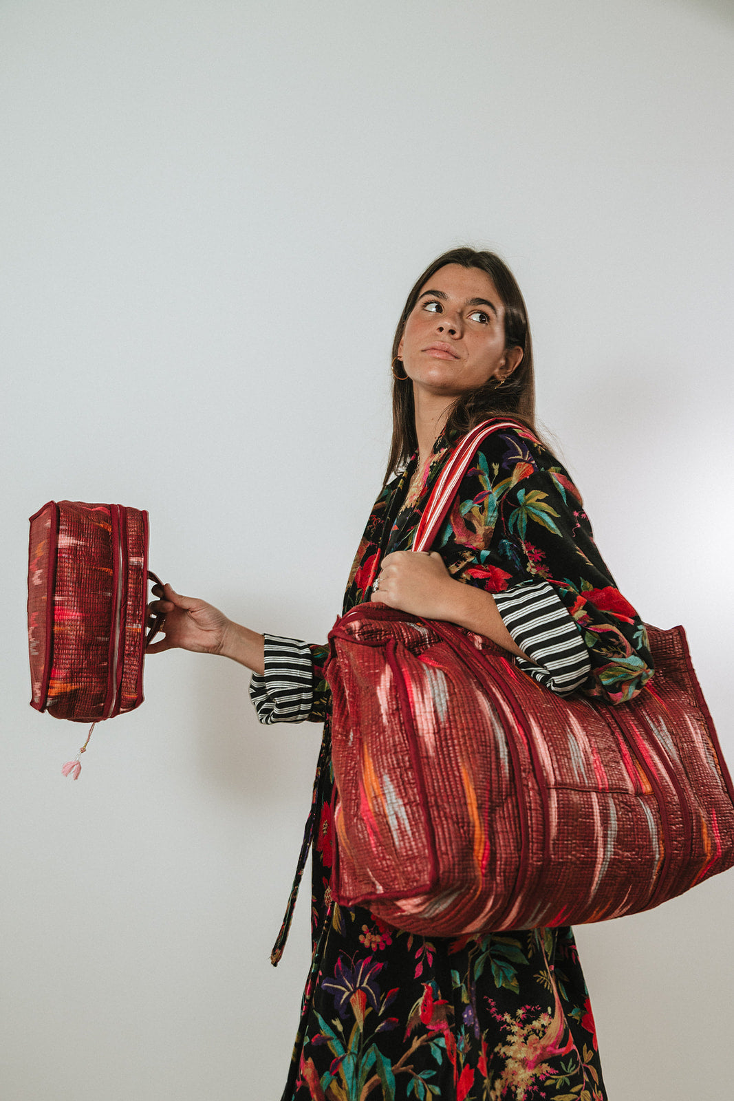 MAGENTA SUITCASE AND TOILETRY BAG